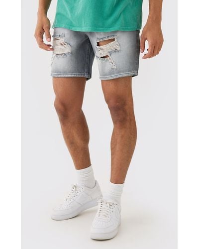 BoohooMAN Relaxed Rigid Ripped Tinted Denim Shorts - Blue