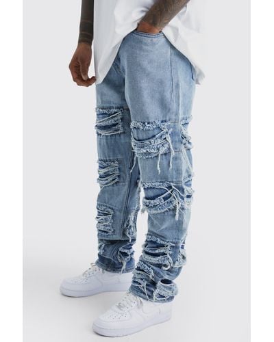 BoohooMAN Relaxed Fit All Over Frayed Panel Jeans - Blue