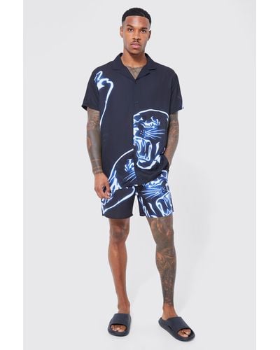 Boohoo Kurzärmliges Oversize T-Shirt und Badehose mit Tigerprint - Blau