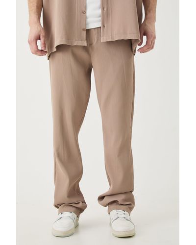 BoohooMAN Tall Elasticated Waist Slim Flare Stacked Pleated Trouser - Natural