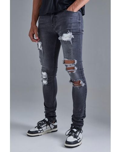 BoohooMAN Skinny Stretch Stacked White Pu Biker Rip & Repair Jeans - Blau