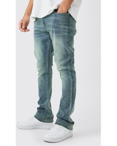 BoohooMAN Skinny Stretch Flare Jean In Antique Blue