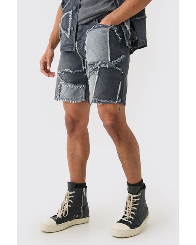 BoohooMAN Distressed Patchwork Relaxed Denim Short In Charcoal - Blue