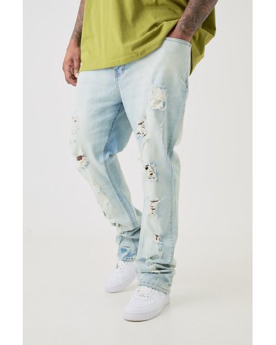BoohooMAN Plus Distressed Multi Ripped Skinny Flared Jeans - Blue