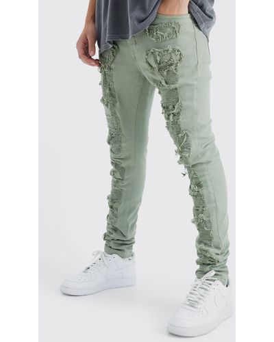 BoohooMAN Skinny Stretch Jeans mit Rissen - Grün