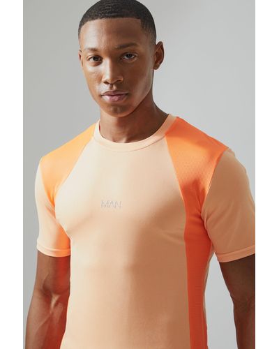 BoohooMAN Man Active Muscle Fit Mesh Colorblock T-Shirt - Orange