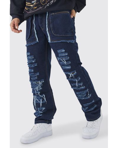 BoohooMAN Lockere zerrissene Jeans mit Cargo-Taschen - Blau