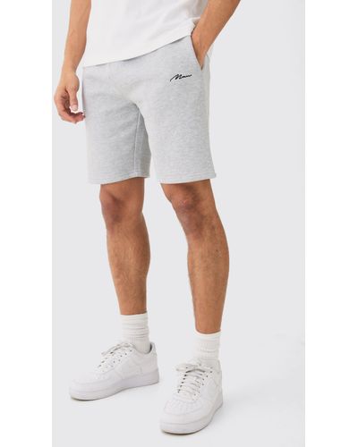 BoohooMAN Man Signature Loose Fit Mid Length Shorts - White