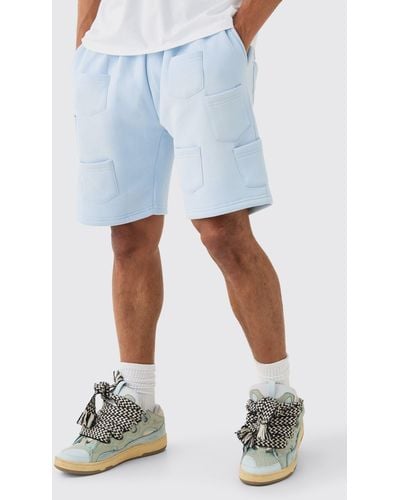 BoohooMAN Relaxed All Over Pocket Spray Wash Shorts - Blue