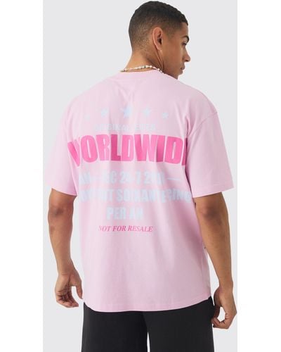 BoohooMAN Oversized Extended Neck Distressed Worldwide T-shirt - Pink