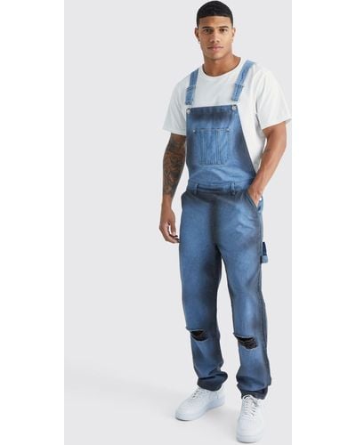 BoohooMAN Relaxed Spray Paint Dungaree - Blue
