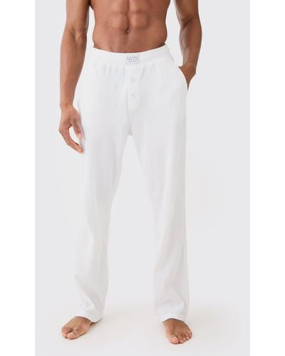 BoohooMAN Relaxed Fit Waffle Lounge Bottoms In White