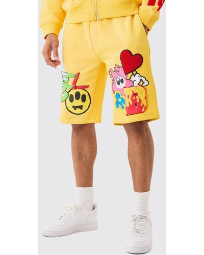 BoohooMAN Loose Embroidered Spray Shorts - Yellow