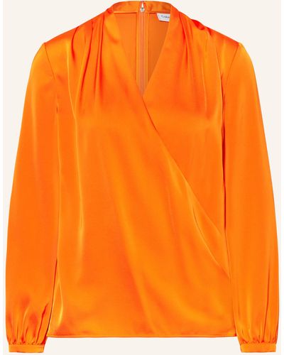 Calvin Klein Blusenshirt in Wickeloptik aus Satin - Orange