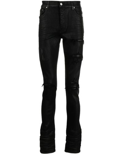 Amiri Wax Logo Skinny Jeans - Black