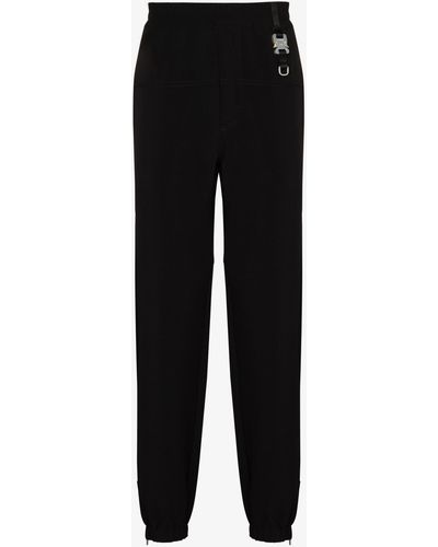 1017 ALYX 9SM Buckled Tapered Track Trousers - Men's - Cotton/elastane/polyamide/polyesterpolyester - Black