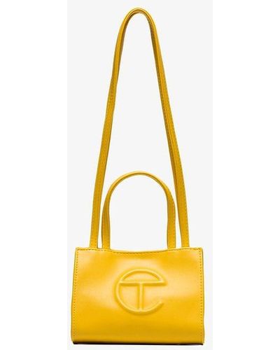 Yellow Telfar  Black bag outfit, Outfits for mexico, Yellow bag
