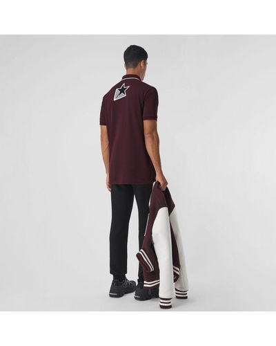 Burberry Oversize-Poloshirt aus Baumwollpiqué mit Buchstabengrafik - Lila