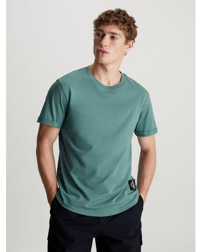 Calvin Klein T-shirt en coton avec insigne - Bleu