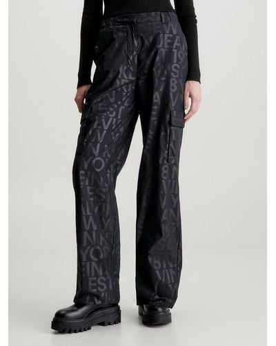 Calvin Klein Pantalon cargo entièrement imprimé - Noir