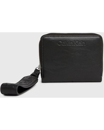 Calvin Klein Portefeuille zippé anti-RFID avec dragonne - Noir