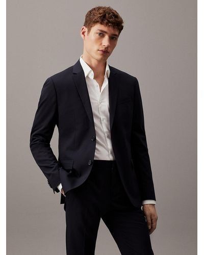 Calvin Klein Veste blazer slim simple boutonnage en laine lastique - Bleu