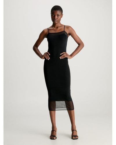 Calvin Klein Robe nuisette mi-longue à pans transparents - Noir