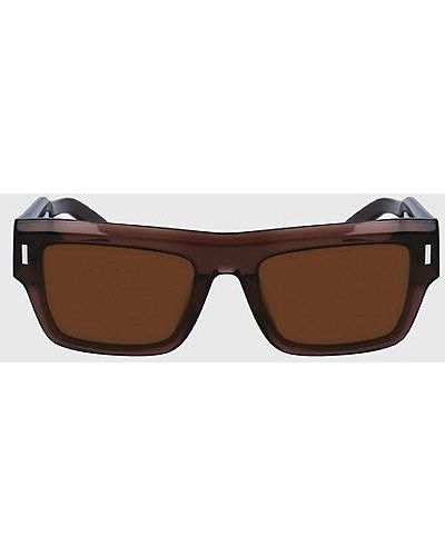 Calvin Klein Quadratische Sonnenbrille CK23504S - Braun