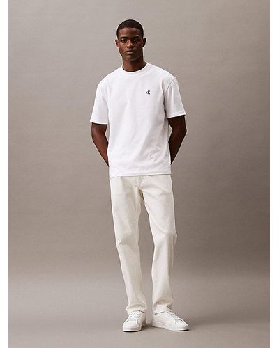 Calvin Klein T-Shirt mit Rundhalsausschnitt, relaxter Passform und Archive-Logo - Weiß