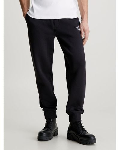 Calvin Klein Pantalon de jogging en polaire avec monogramme - Noir