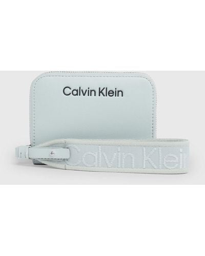 Calvin Klein Portefeuille zippé anti-RFID avec dragonne - Neutre