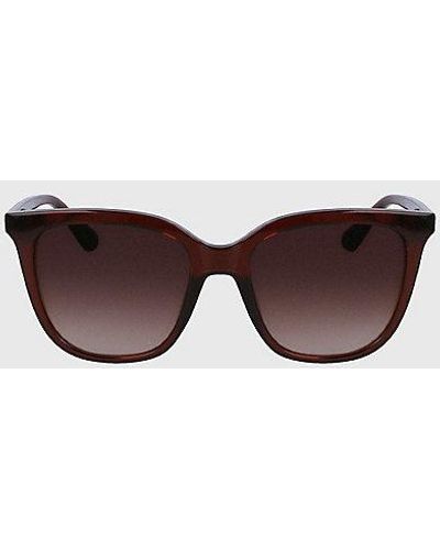 Calvin Klein Rechteckige Sonnenbrille CK23506S - Braun