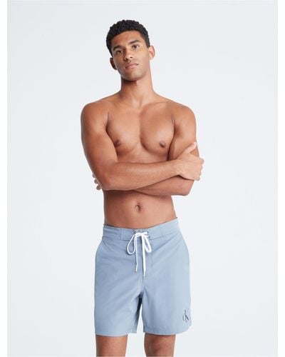 Calvin Klein Allover Monogram Logo Swim Shorts in Blue for Men