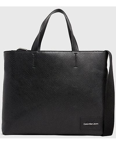 Calvin Klein Schmale Tote-Bag aus Schlangenleder - Schwarz