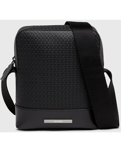 Calvin Klein Petit sac reporter avec logo - Noir