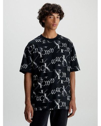 Calvin Klein Relaxed T-shirt Met All-over Logo - Zwart