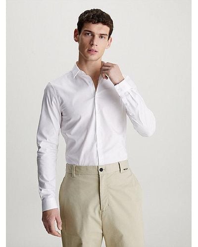 Calvin Klein Camisa extra slim de popelín elástico - Blanco