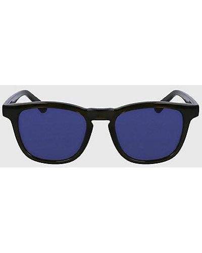 Calvin Klein Rechteckige Sonnenbrille CK23505S - Blau