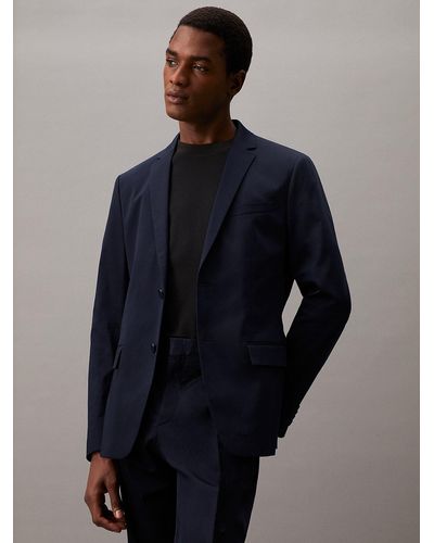 Calvin Klein Blazer slim en satin de coton élastique - Bleu