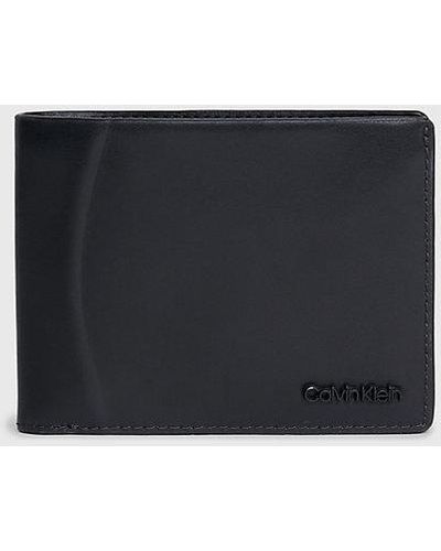 Calvin Klein Dreifach faltbares RFID-Lederportemonnaie - Schwarz