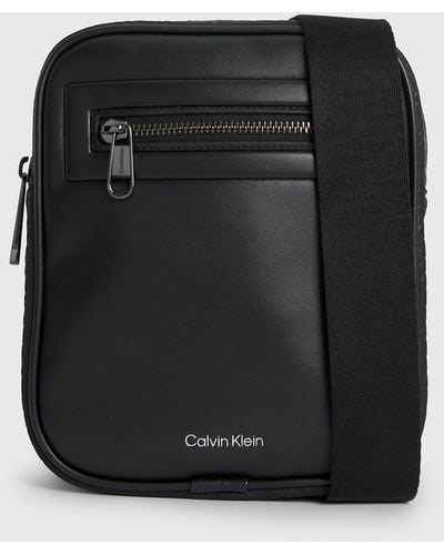Calvin Klein Petit sac reporter en bandoulière avec logo - Noir