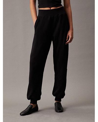 Calvin Klein Pantalón de chándal holgado con monograma - Negro