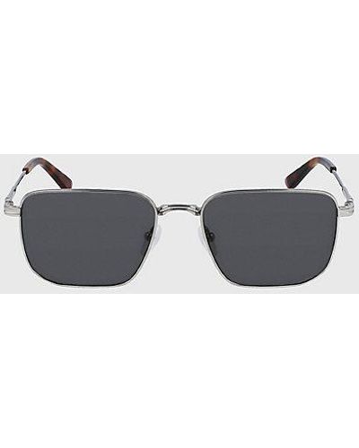 Calvin Klein Rechteckige Sonnenbrille CK23101S - Mettallic