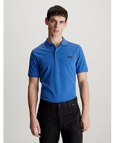 Calvin Klein Schmales Poloshirt aus Stretch-Piqué - Blau