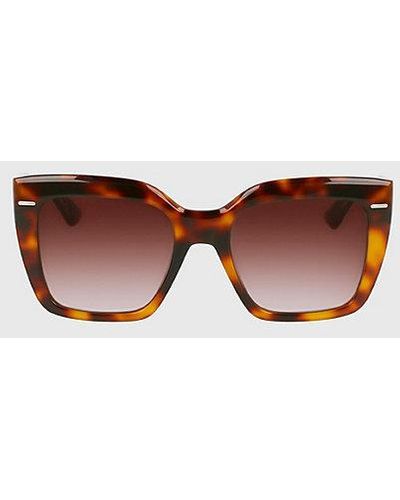 Calvin Klein Rechteckige Sonnenbrille CK23508S - Braun