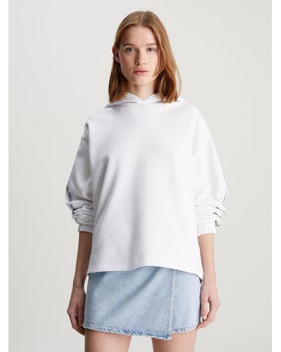 Calvin Klein Sweat-shirt à capuche relaxed avec Logo Tape - Blanc