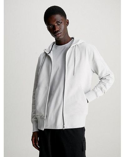 Calvin Klein Sweatshirt INSTITUTIONAL ZIP THROUGH HOODIE mit Logomarkenlabel - Weiß
