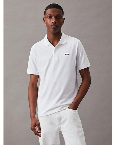 Calvin Klein Polo slim de piqué elástico - Blanco