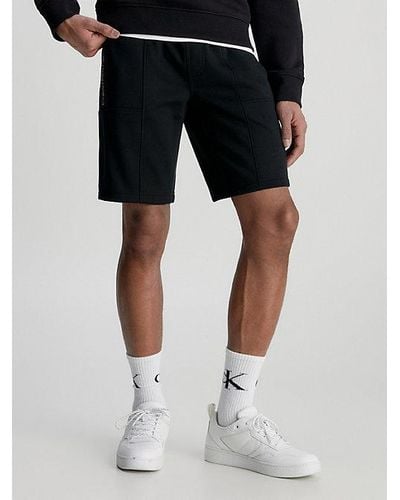 Calvin Klein Shorts de chándal con logo tape - Negro