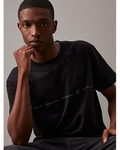Calvin Klein Camiseta con logo repetido - Negro